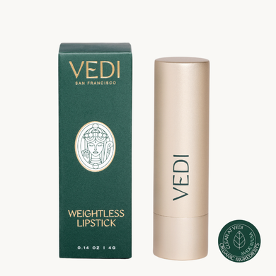 Closed lipstick and green packaging