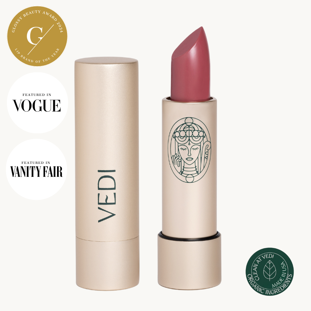 Vedi lipstick in pink city packaging on a white background